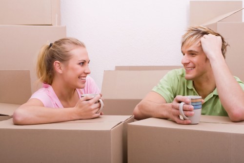 Professional movers packing items in Bromley Storage